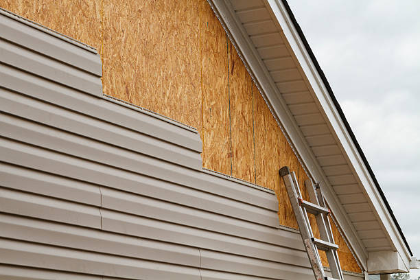 Professional Siding Contractor technician working in Wingate, MD